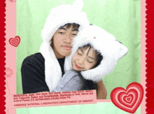 a picture of a boy and a girl hugging with the words hawkins national laboratory department of energy at the bottom