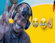 a man wearing headphones shows a peace sign and a tearful face