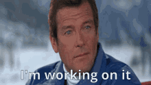 Im Working On It Roger Moore GIF