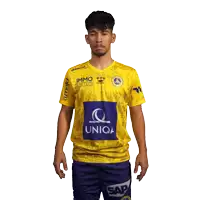 a man wearing a yellow shirt that says uniqa