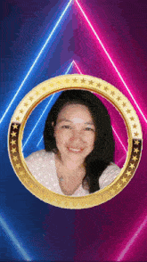 a woman is smiling in a gold circle with stars around her