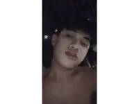 a young man without a shirt is taking a selfie
