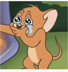 jerry from tom and jerry is crying and covering his mouth with his hand