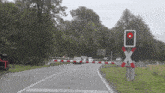 a road with a red x and a white x
