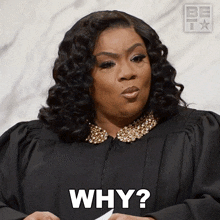 a woman in a judge 's gown says why