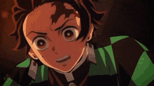 a close up of a person 's face with a surprised look on their face