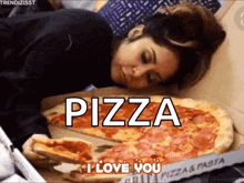 a woman laying on a bed next to a pizza box that says pizza i love you on it