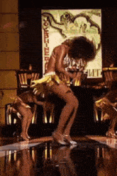 a woman is dancing on a stage in front of a sign that says `` southerners '' .