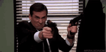 Dual Wielding - The Office GIF - The Office Office Pistols GIFs