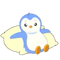 a penguin is sitting on a yellow pillow