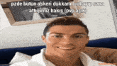a man sitting on a couch with a caption that says pzde bütün askeri dükkani lootlayip cana