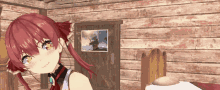 a girl with red hair is standing in front of a wooden wall with a picture on it