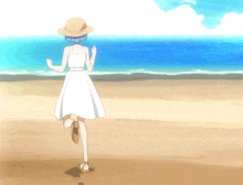 a girl in a white dress is dancing on the beach
