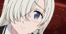 a close up of a cartoon character with white hair and blue eyes .