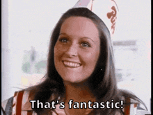 a woman wearing a hat that says that 's fantastic