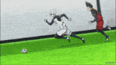 two soccer players are running after a soccer ball on a field ..