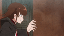a girl in a cape is standing in front of a door