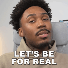a man sitting in a chair with the words let 's be for real above his head