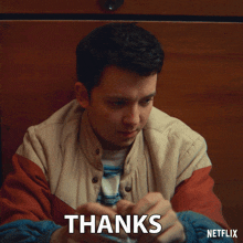 a man in a jacket says thanks on a netflix advertisement