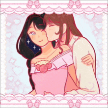 a girl in a pink dress kisses another girl on the forehead