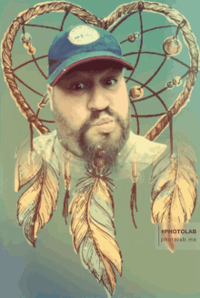 a man in a blue hat is surrounded by feathers and a dream catcher