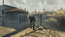 a man is walking on the roof of a building with a ladder