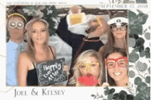 a group of people are posing for a photo in a photo booth .