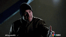 a man giving a thumbs up with the hashtag #chicagopd on the bottom