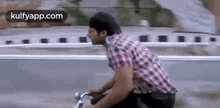 Prabhas In Eeshwar Movie.Gif GIF - Prabhas In Eeshwar Movie Bicycle Prabhas GIFs