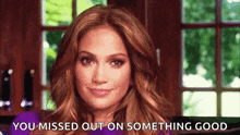 a woman in a purple dress is smiling and says `` you missed out on something good '' .