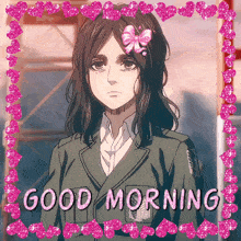 a picture of a girl with a flower in her hair and the words good morning on the bottom