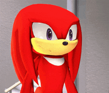 a red cartoon character with purple eyes and a yellow face