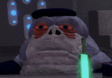 a stuffed animal is holding a green light saber