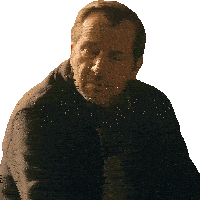 a man with a beard wearing a black sweater