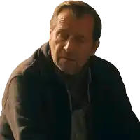 a man with a beard wearing a black sweater