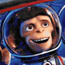 a cartoon monkey wearing a space helmet is smiling .