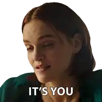 a woman says it 's you in a green sweater