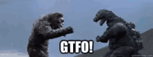 two monsters are fighting with the words gtfo written on the bottom
