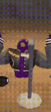 a cartoon character is standing on a pole with his arms outstretched in a video game .