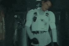 a man in a storm trooper costume is surrounded by fire