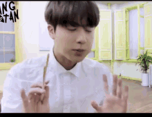 jin eats seasoned chicken chopsticks no words food