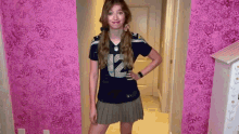 a girl wearing a jersey with the number 12