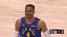 a basketball player wearing a jersey with the number 4 on it