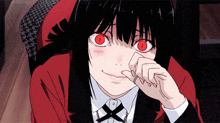 a close up of a girl with red eyes