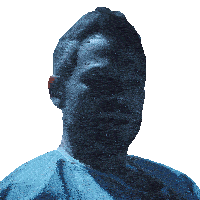 a close up of a man 's face with a blue shirt on