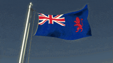 a blue flag with a red lion on the bottom