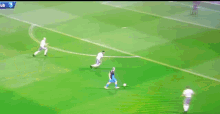 a soccer game is being played in a stadium with a twitter ad in the stands