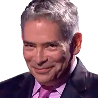a man wearing a suit and tie smiles for the camera