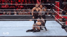 a woman in a wrestling ring with the word usa on the bottom right