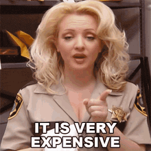 It Is Very Expensive Deputy Clementine Johnson GIF - It Is Very Expensive Deputy Clementine Johnson Wendi Mclendon Covey GIFs